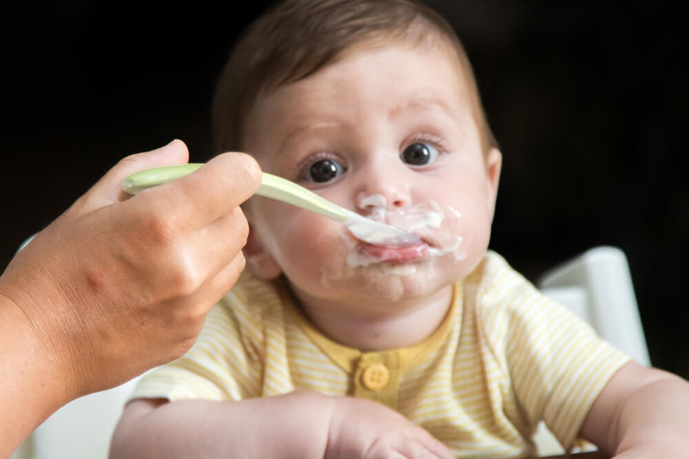 Feeding a baby boy