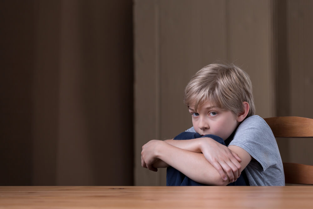 A child staring in fear - Strict Parents Raise Sneaky Kids