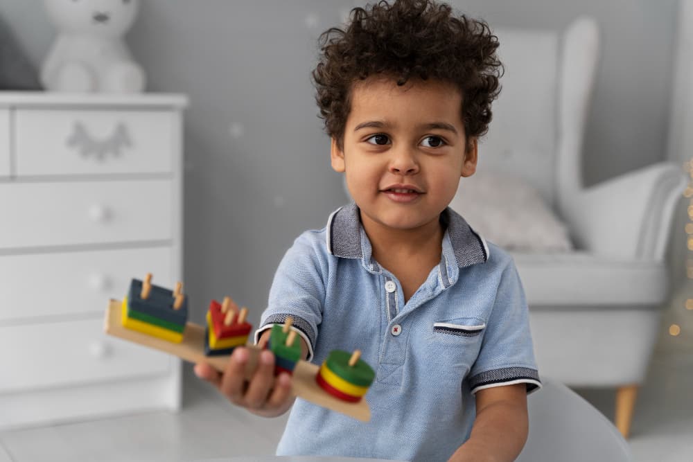 child enjoying didactic game