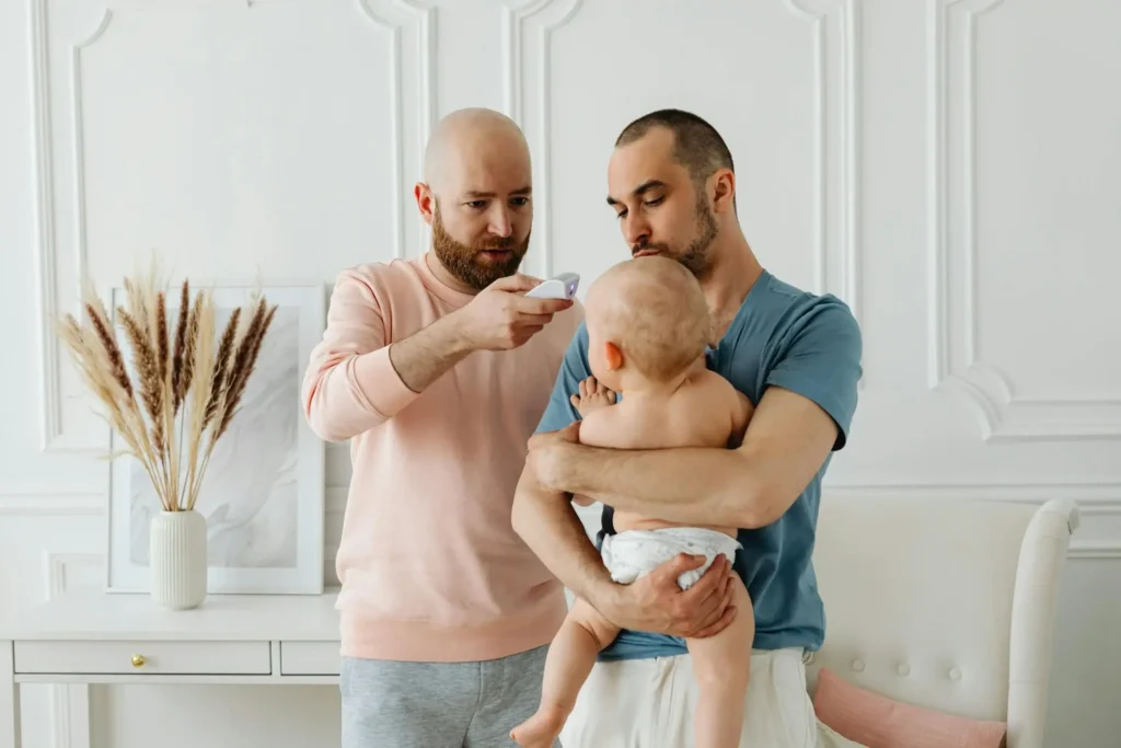 Worried parents taking child's temperature